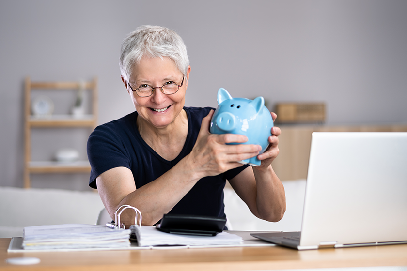 happy woman saving money personal finance budget