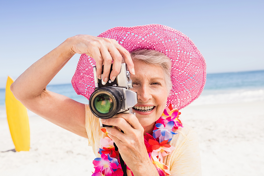 senior woman taking picture