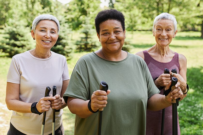 Waist up portrait of three sportive senior women